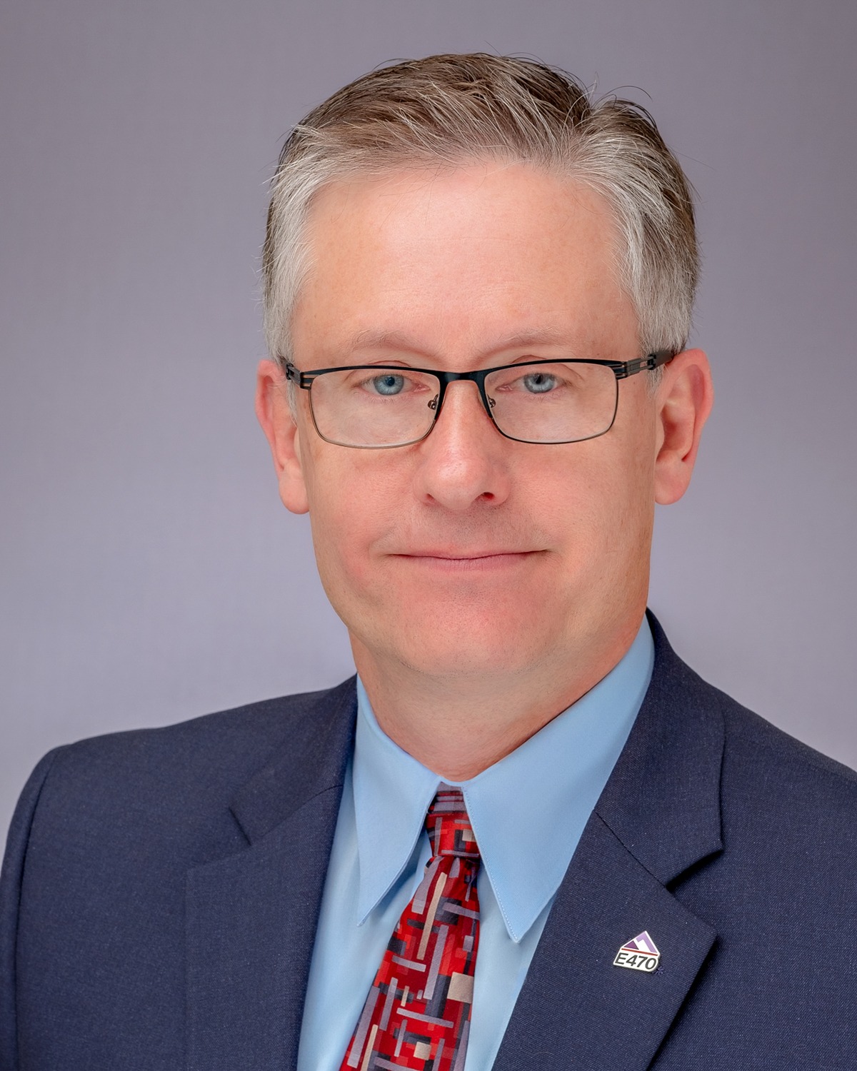Senior staff member Timothy E. “Tim” Stewart